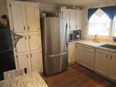 Welcome to Forest Lake Estates!! A 5-star 55+plus gated - photo 10