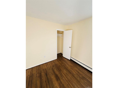 High Ranch With Updated Kitchen And Large Living Room. Hardwood - photo 11