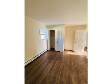 High Ranch With Updated Kitchen And Large Living Room. Hardwood - photo 13