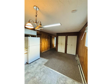 High Ranch With Updated Kitchen And Large Living Room. Hardwood - photo 15