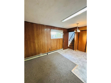 High Ranch With Updated Kitchen And Large Living Room. Hardwood - photo 19