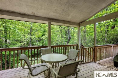Set among the peaceful woods of Lake Toxaway Estates, this - photo 22
