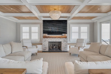 Welcome to 55 Walnut Road, a stunning bayfront masterpiece. This