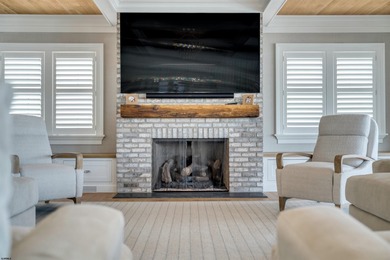 Welcome to 55 Walnut Road, a stunning bayfront masterpiece. This