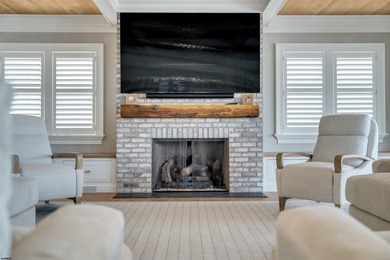 Welcome to 55 Walnut Road, a stunning bayfront masterpiece. This