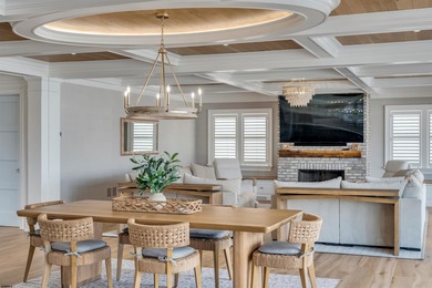 Welcome to 55 Walnut Road, a stunning bayfront masterpiece. This