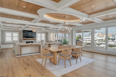 Welcome to 55 Walnut Road, a stunning bayfront masterpiece. This