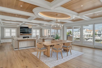 Welcome to 55 Walnut Road, a stunning bayfront masterpiece. This