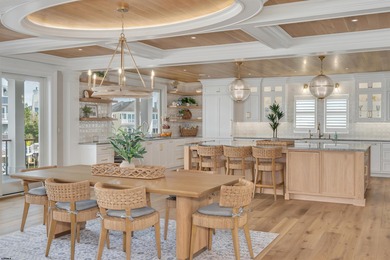 Welcome to 55 Walnut Road, a stunning bayfront masterpiece. This