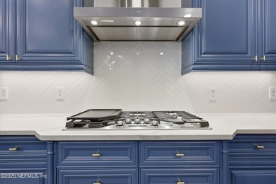 **$60,000 price improvement!!** Discover an elevated standard of - photo 25