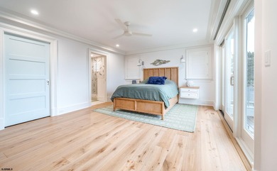 Welcome to 55 Walnut Road, a stunning bayfront masterpiece. This