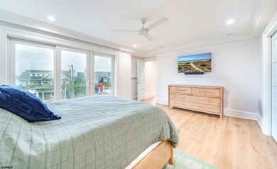 Welcome to 55 Walnut Road, a stunning bayfront masterpiece. This