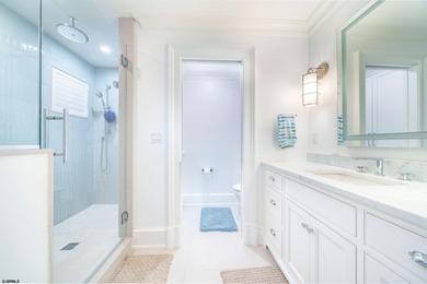 Welcome to 55 Walnut Road, a stunning bayfront masterpiece. This