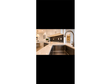 Welcome to this stunning 3-bedroom, 2-bath waterfront - photo 5