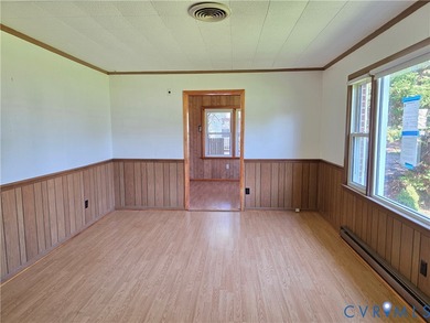 Welcome to this charming brick ranch conveniently located near