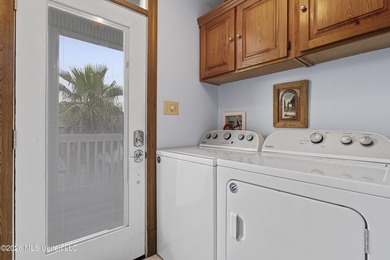 WATERFRONT LIVING AT ITS FINEST! Situated on the beautiful - photo 25