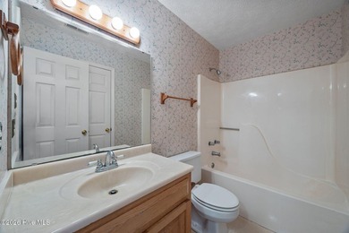 Welcome to this inviting former model home located in the highly - photo 11