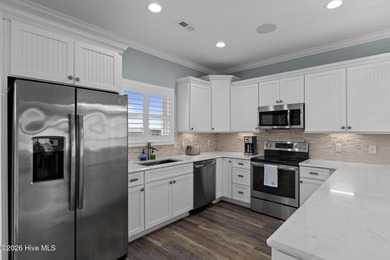 Located in North Topsail Beach, this custom-featured, truly