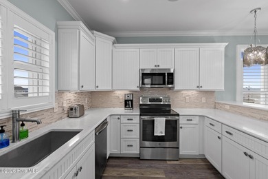 Located in North Topsail Beach, this custom-featured, truly