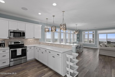 Located in North Topsail Beach, this custom-featured, truly