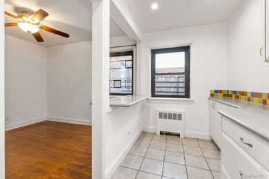 Bathed in natural light from its north and east exposures, this - photo 4