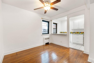 Bathed in natural light from its north and east exposures, this - photo 8