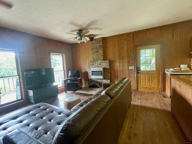 Welcome home to your Ozark oasis on the beautiful George's