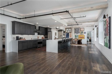 Step into refined downtown living with Unit 600 at The Alston, a