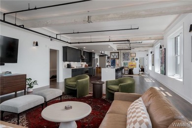 Step into refined downtown living with Unit 600 at The Alston, a