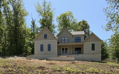 Located in the established Watercrest subdivision, this home - photo 1
