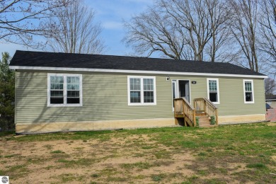 Lake Home For Sale in Buckley, Michigan
