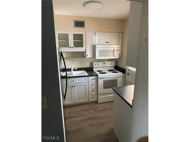 Welcome to this charming first-floor condo in the peaceful - photo 15