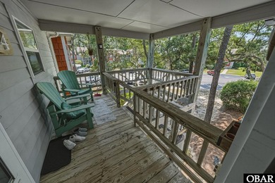 Tucked beneath a canopy of mature live oak trees in the Oyster - photo 3