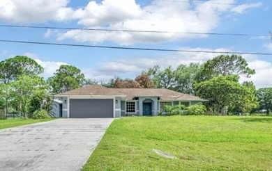 Welcome to this charming 3/2/2 home located on an oversized - photo 1