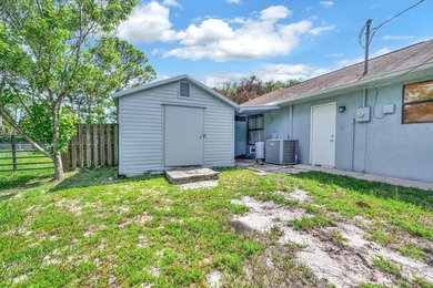 Welcome to this charming 3/2/2 home located on an oversized - photo 3
