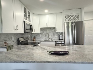 Welcome to this charming one-bedroom, one-bathroom condominium - photo 3