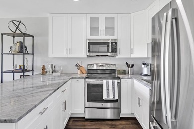 Welcome to this charming one-bedroom, one-bathroom condominium - photo 7