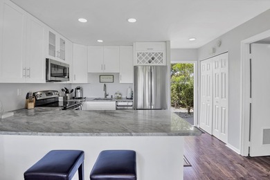 Welcome to this charming one-bedroom, one-bathroom condominium - photo 8