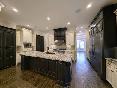 Welcome to 400 Chamberlin Road! This custom waterway home offers - photo 11