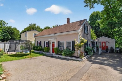 Nestled in a picturesque waterfront setting, this single family - photo 1
