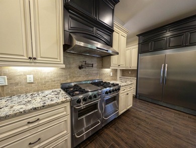 Welcome to 400 Chamberlin Road! This custom waterway home offers - photo 12