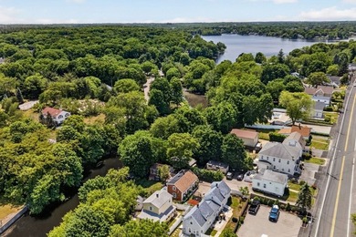Nestled in a picturesque waterfront setting, this single family - photo 4