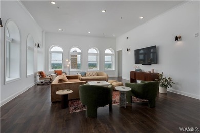 Perched above downtown, Unit 700 at The Alston is an impressive