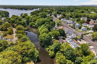 Nestled in a picturesque waterfront setting, this single family - photo 5