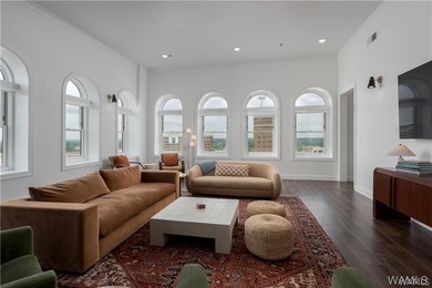 Perched above downtown, Unit 700 at The Alston is an impressive