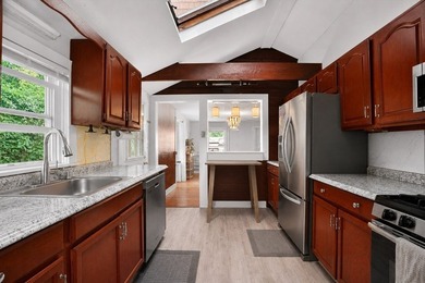 Nestled in a picturesque waterfront setting, this single family - photo 6