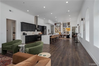 Perched above downtown, Unit 700 at The Alston is an impressive