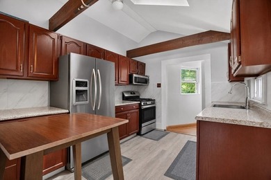 Nestled in a picturesque waterfront setting, this single family - photo 7
