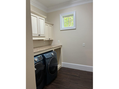 Welcome to 400 Chamberlin Road! This custom waterway home offers - photo 18