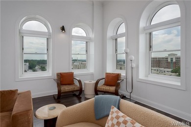 Perched above downtown, Unit 700 at The Alston is an impressive